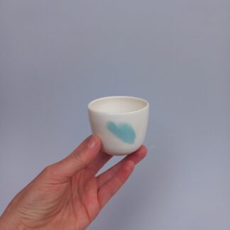 S modrým vtočeným srdíčkem