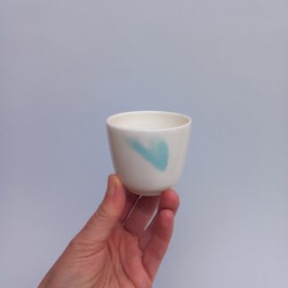 S modrým vtočeným srdíčkem